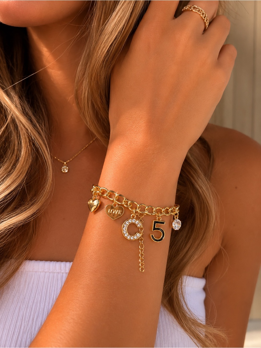 Gold charm bracelet